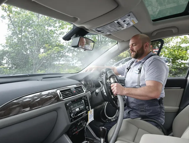 Sharon Air Duct Cleaning specialist performing professional car duct cleaning in Sharon
