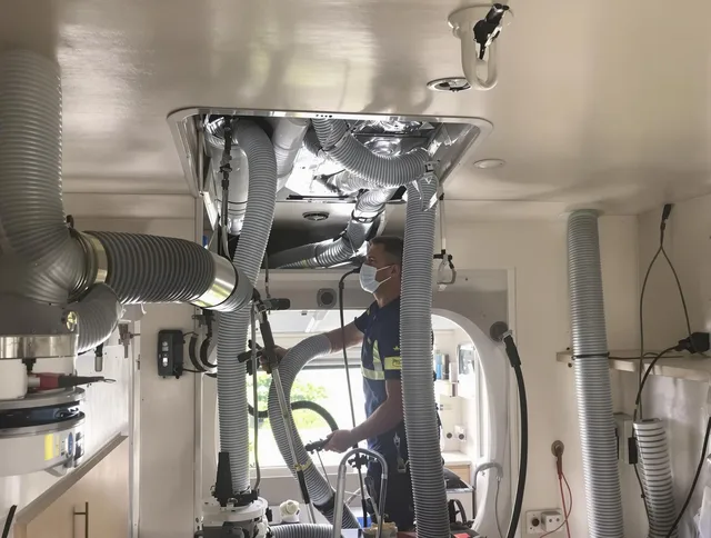 Sharon Air Duct Cleaning specialist performing precise mobile home duct cleaning in Sharon